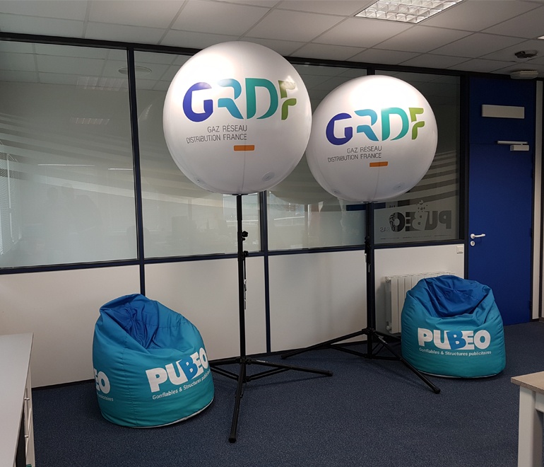 Two giant GRDF balloons inflated with air and placed on tripods