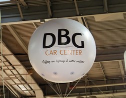 Focus on a giant helium balloon with the DBG logo