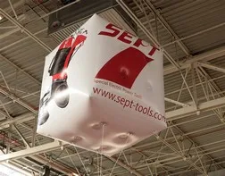 Giant advertising helium cube at a trade show