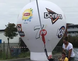 Continuous-blow hot air balloon for a bungee jumping event with Doritos