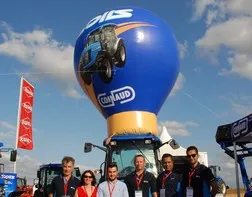 Giant hot air balloon placed on a Coinaud tractor at an agricultural fair