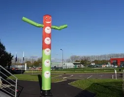 A wind sleeve or skydancer for a wines and terroirs store